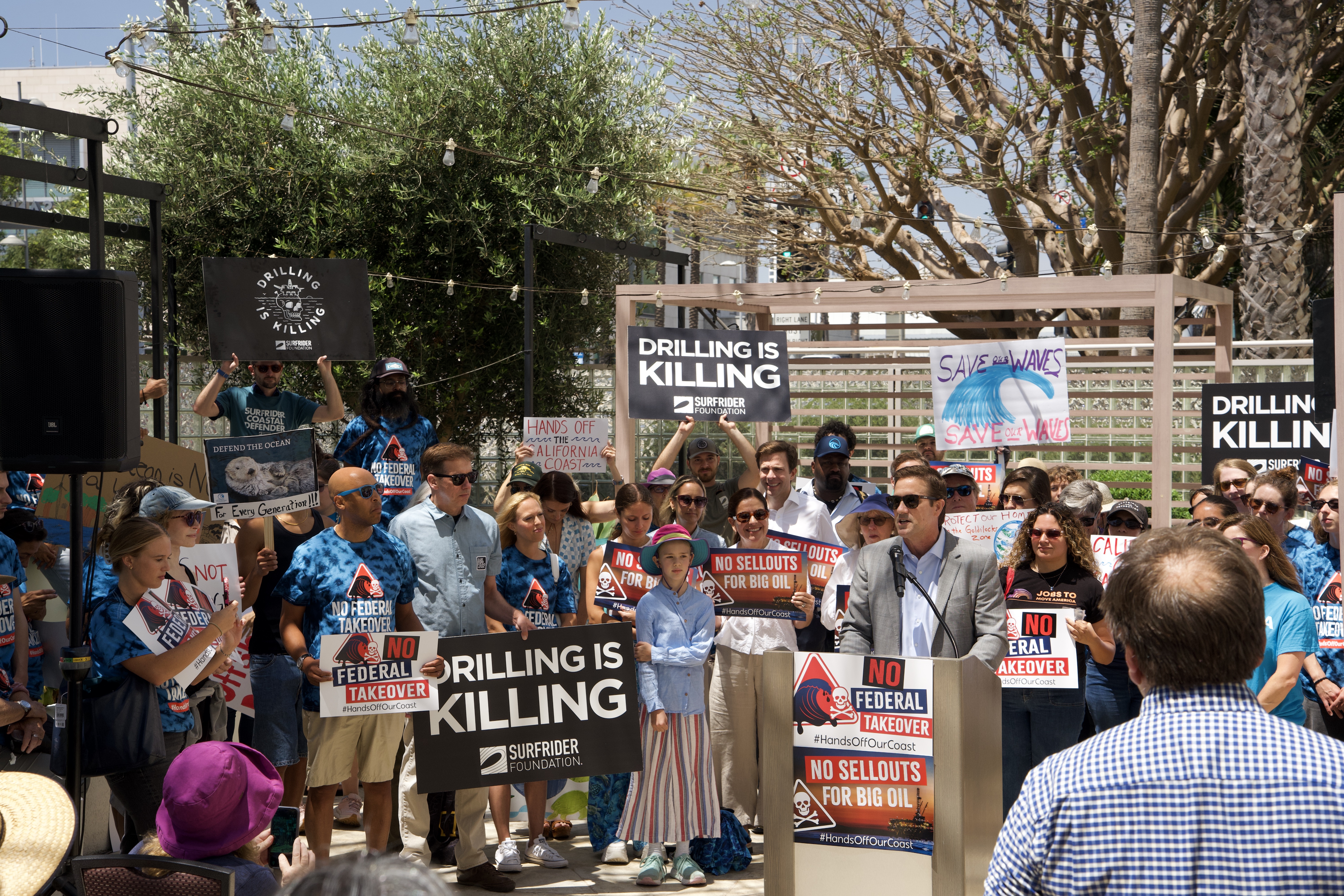 Grant Bixby speaks at the Santa Monica rally. Photo by Michaela Coats